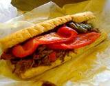 A photo of an Italian hoagie with red roasted peppers at the Italian Food and Heritage Festival