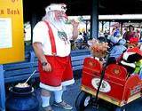 A photo of Santa entertaining at the Kutztown Fair