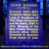 Heritage sign in front of Baker Mansion